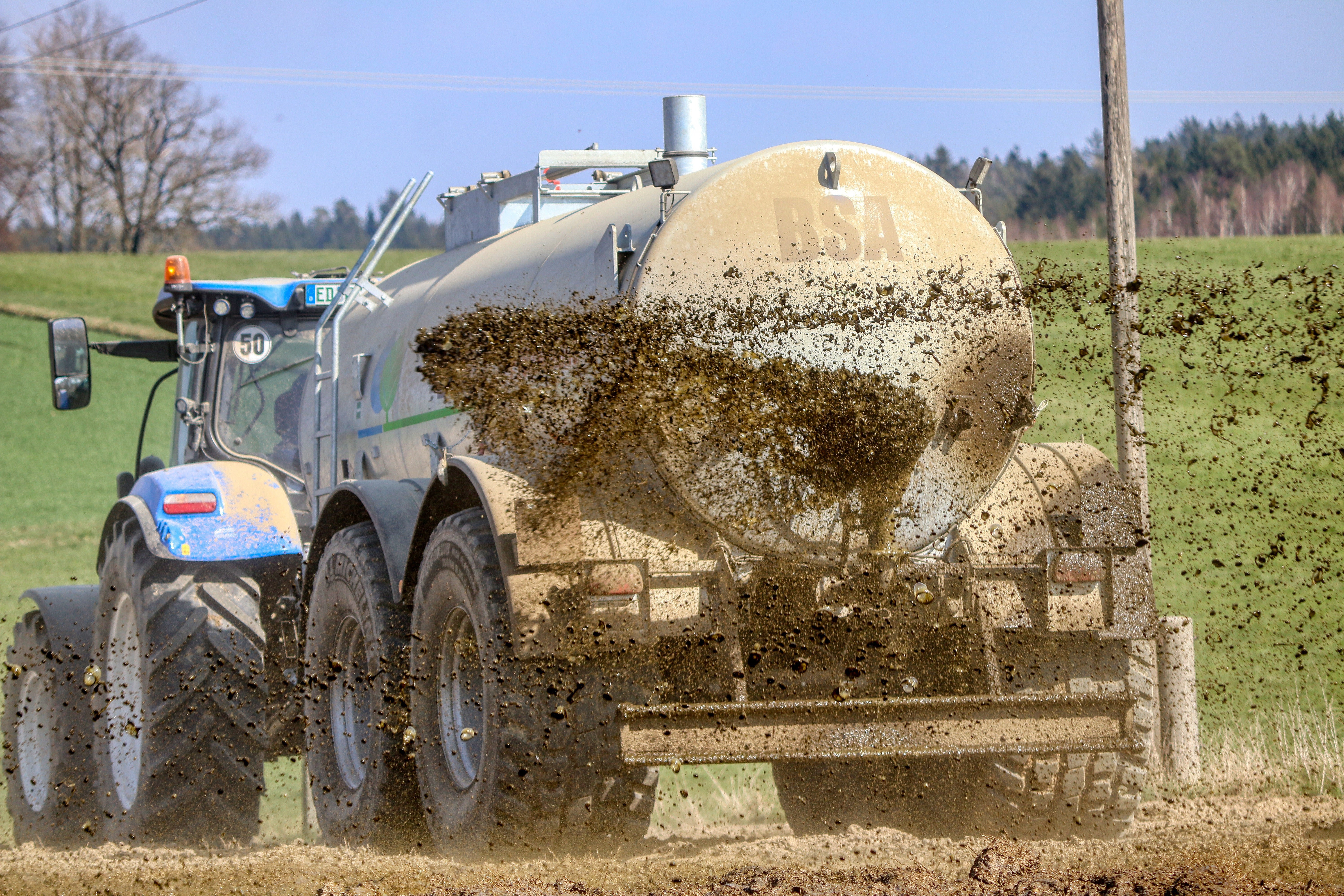 Slurry being spread on agricultural land