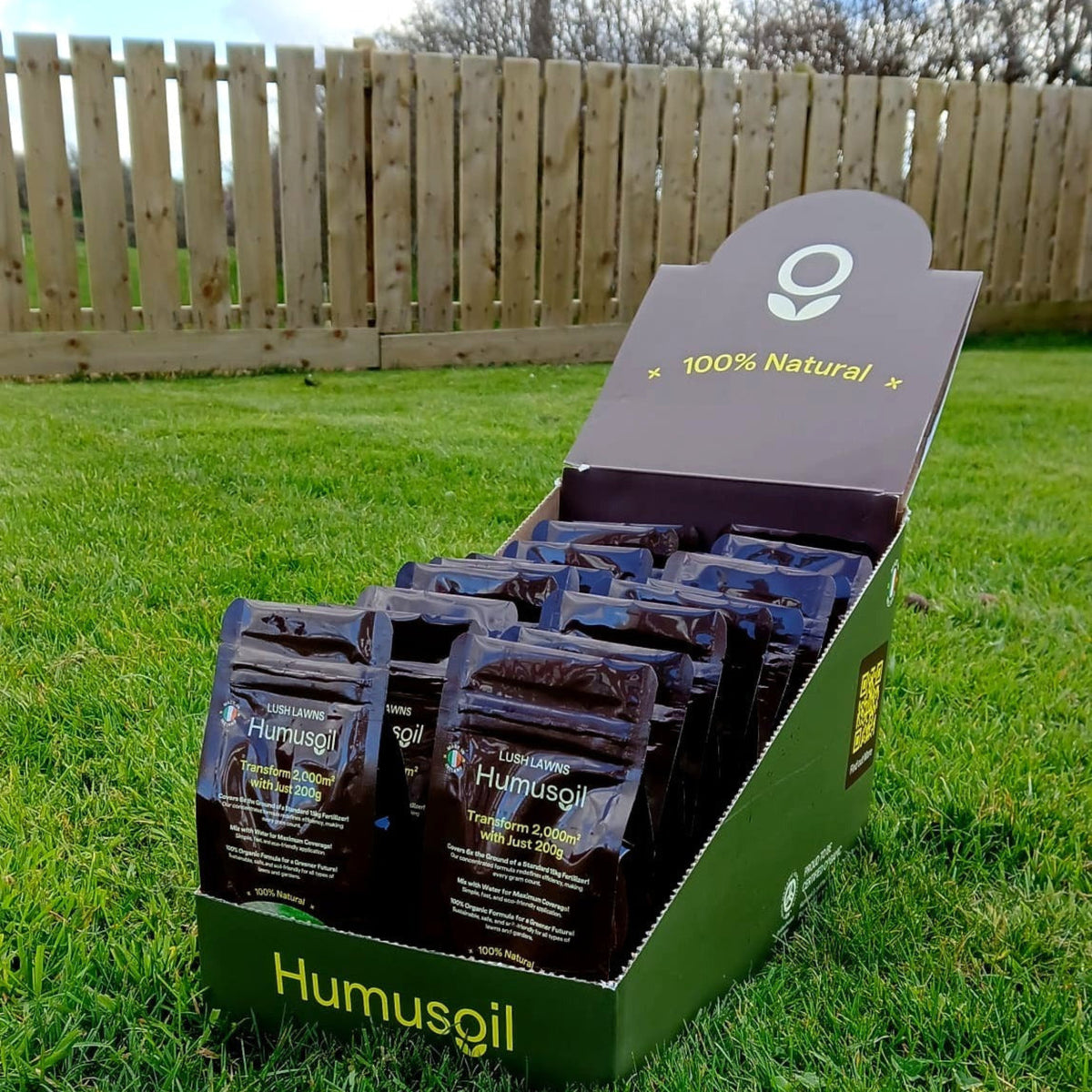 
                  
                    Humusoil Lush Lawns 200g packs displayed on a grass lawn
                  
                